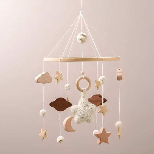 Wooden hanging mobile toy by Petite Pioneers featuring colorful, handcrafted wooden animals and shapes for infants' nursery decor.