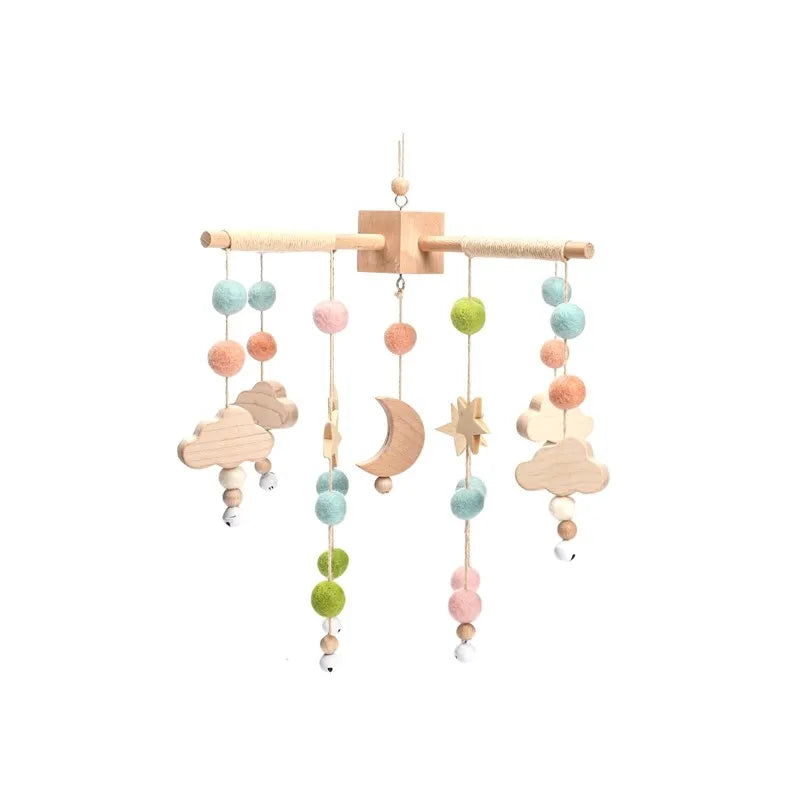 Wooden mobile hanging toys by Petite Pioneers, featuring colorful handcrafted designs for baby nursery decor.