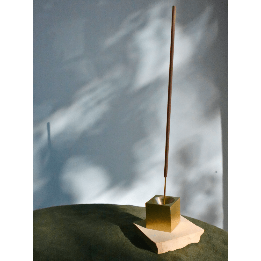 Tilley + Me essential oil incense sticks for aromatherapy displayed with incense holder and packaging.
