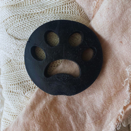 Tilley + Me reusable lint and pet hair remover tool for dog grooming, chemical-free dryer solution in a compact square crop image.