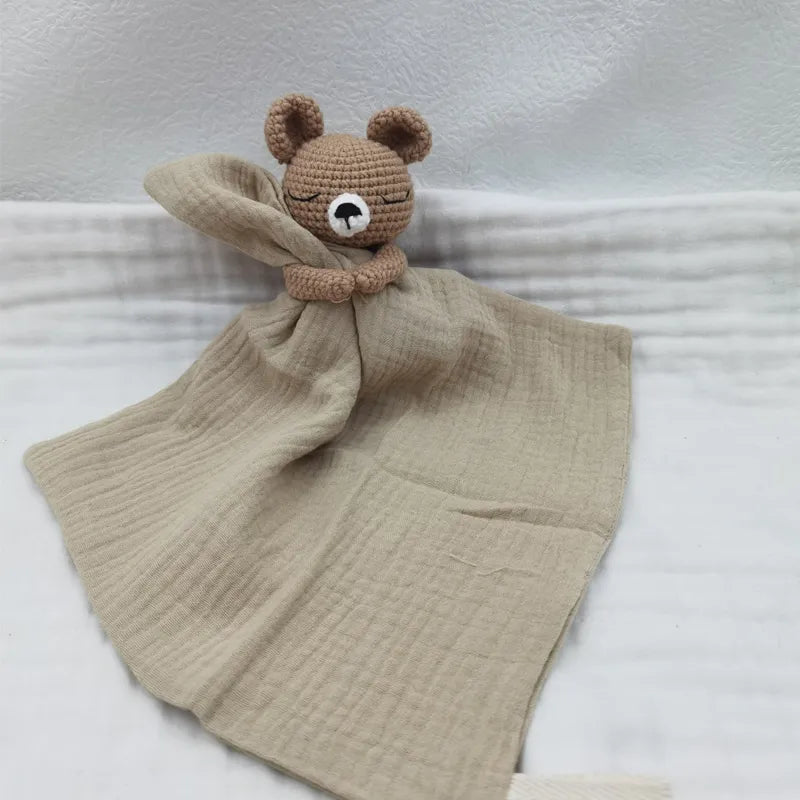 Baby bib with sleeping animals and rattle, Petite Pioneers, soft fabric and cute animal design for infants.