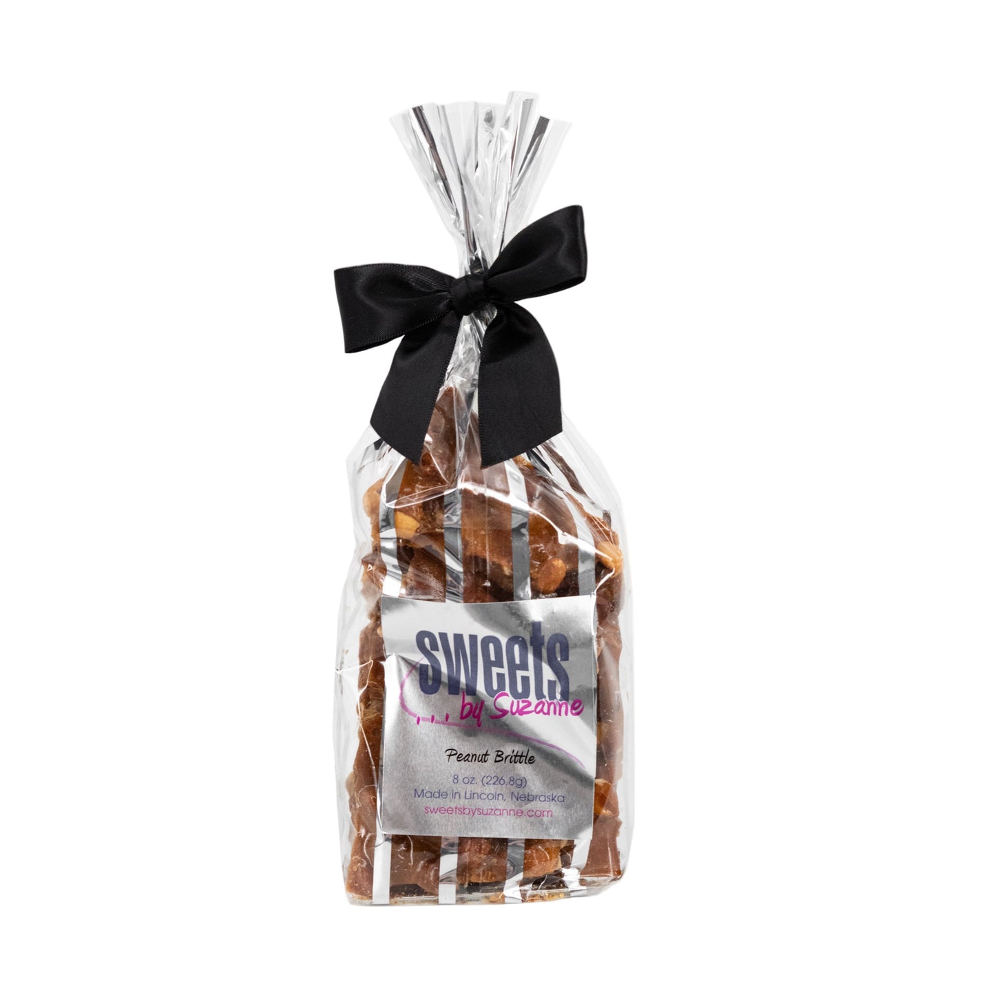 Homemade peanut brittle in an 8 oz package from Sweets by Suzanne, showcasing golden, crunchy peanut candy pieces.