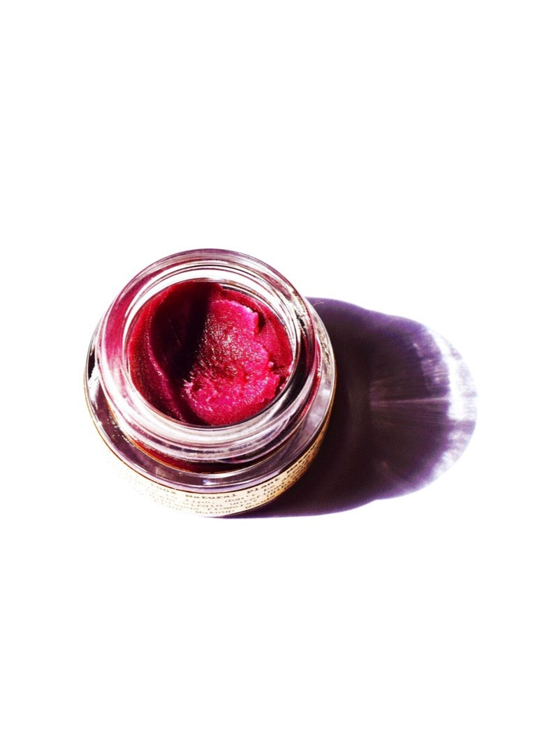 Hibiscus and beet lip tint from plant makeup showing a close-up of the tinted lips with natural, vibrant color.