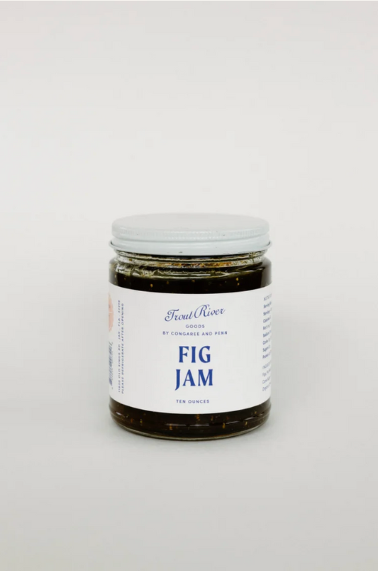 Close-up of Congaree and Penn fig jam preserves in a jar, showcasing its rich, dark color and smooth texture.
