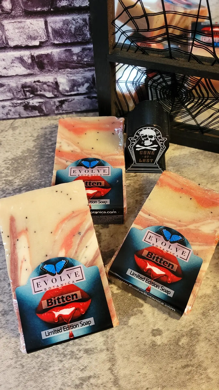 Evolve Botanica Seasonal Soap - Bitten, a natural soap bar with seasonal ingredients, featuring a rustic, textured appearance.