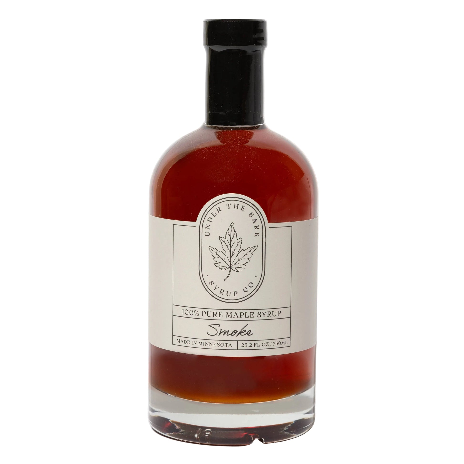 25oz bottle of Smoke Maple Syrup from Under The Bark Syrup Co, featuring rich, dark maple syrup with smoky flavor in a glass bottle
