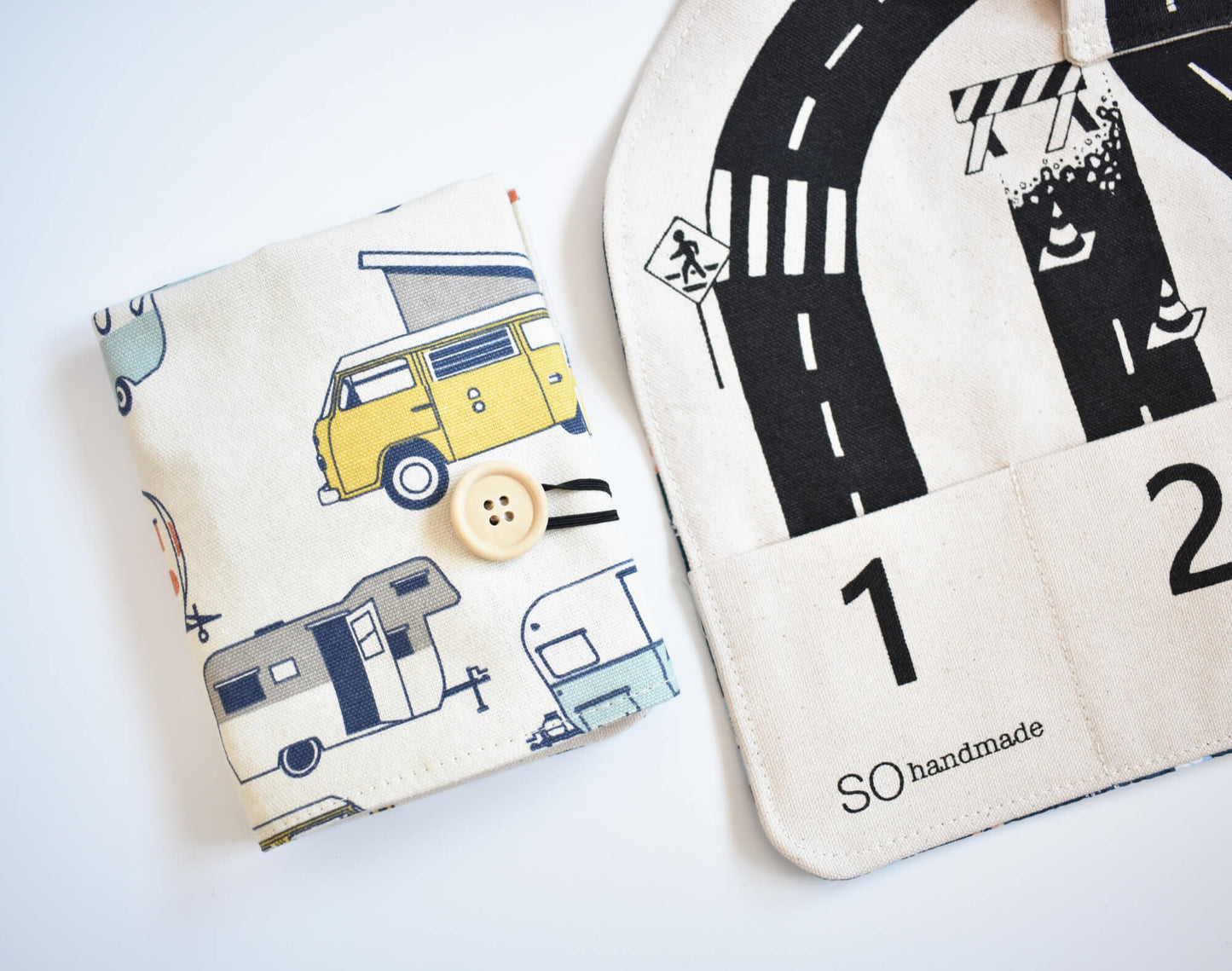 Colorful car-themed playmat by So Handmade Shop with roads and city scenery, perfect for travel and imaginative play.