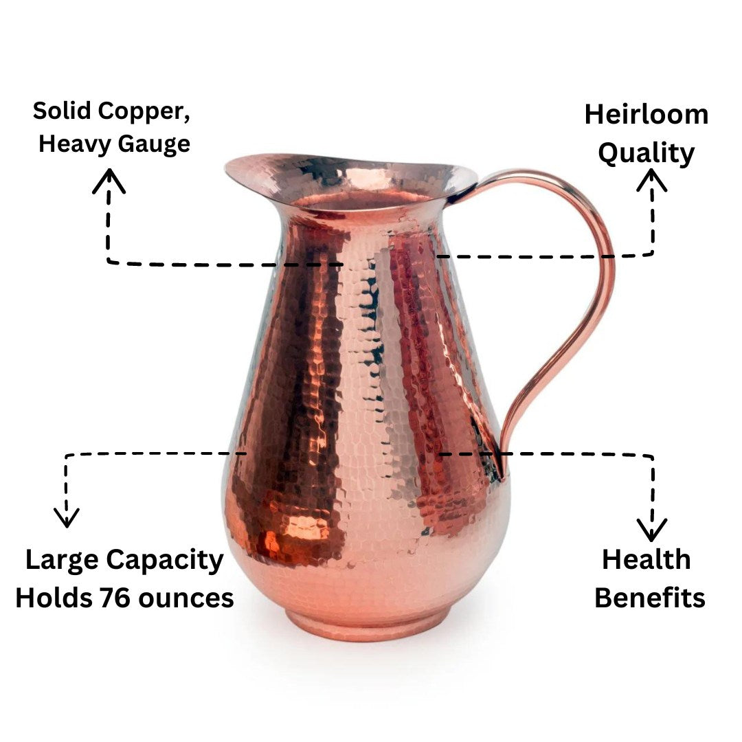 Solid Sertodo copper water pitcher with a traditional design, featuring a polished finish and sturdy handle for serving beverages.