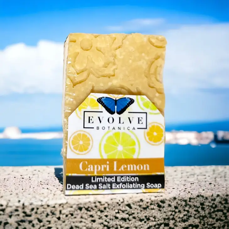 Evolve Botanica Capri Lemon Specialty Salt Bar soap with bright lemon slices and natural salt exfoliants on the soap surface.
