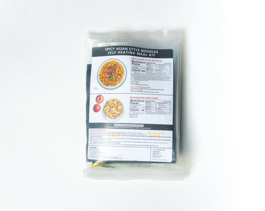 Self-heating spicy Asian-style noodles meal kit by Heaven's Harvest with freeze-dried ingredients on white background.