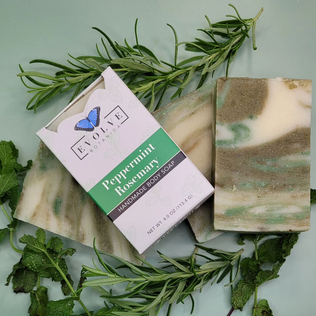 Evolve Botanica peppermint rosemary standard soap bar with herbal scent, showcasing the soap's textured surface and natural ingredients.