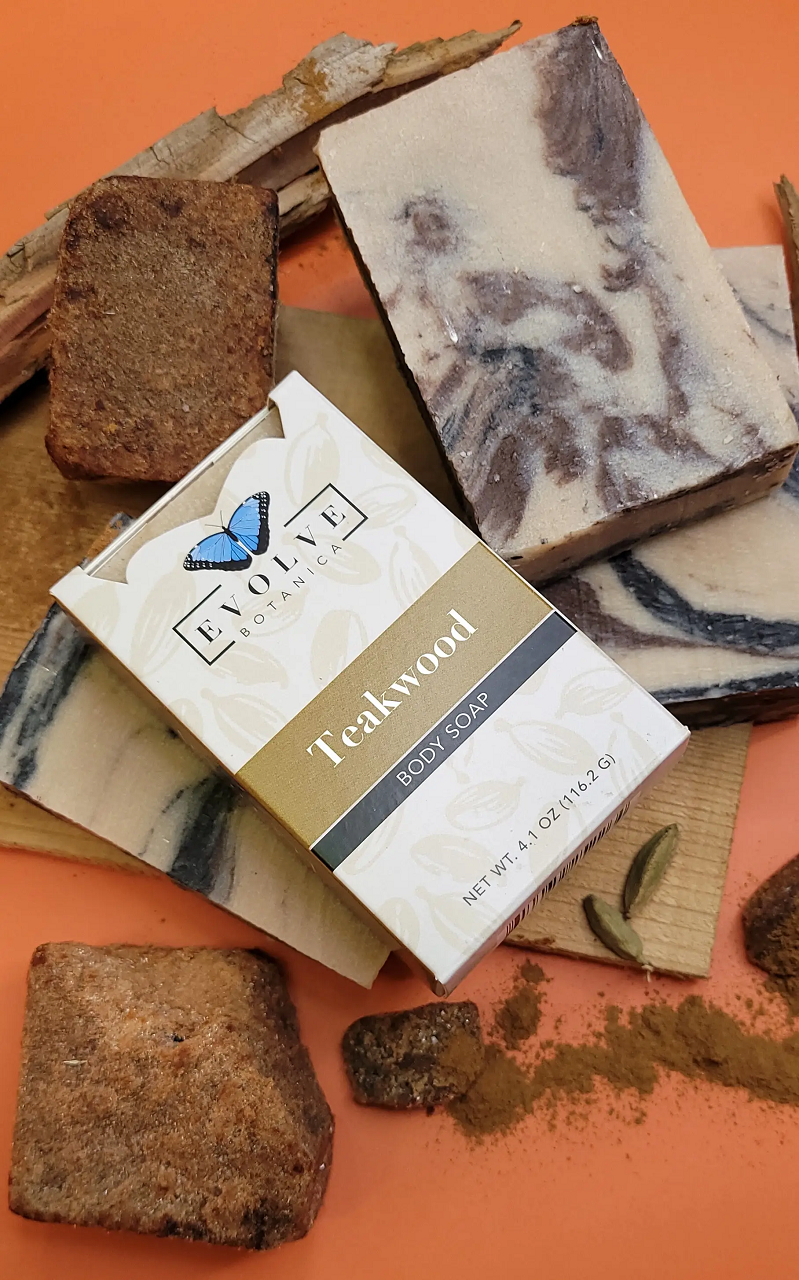 Evolve Botanica teakwood standard soap bar with natural wood scent and minimalist packaging, displayed on a neutral background.