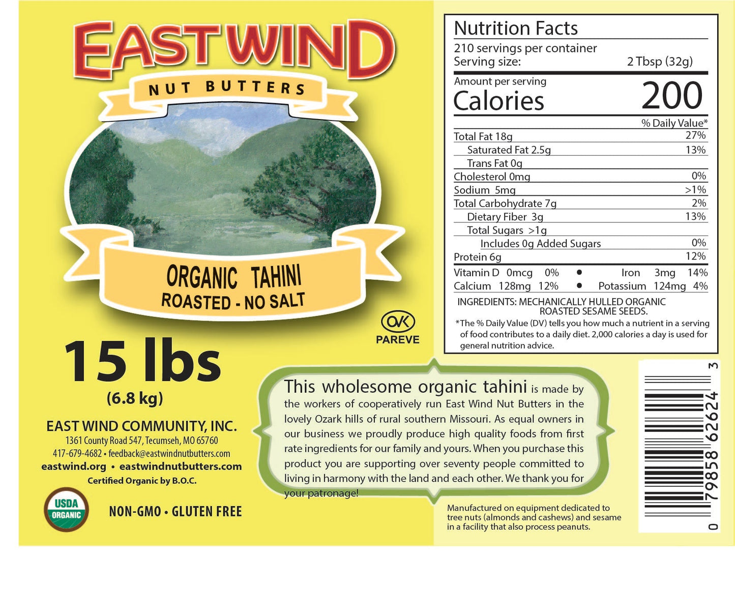 Organic tahini paste from East Wind Crafts in a glass jar with a creamy, smooth texture and natural sesame seed appearance.