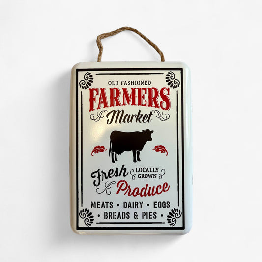 Vintage metal wall art sign featuring a cow and "Farmers Market" text from Iron & Blossom, perfect for rustic farmhouse decor.