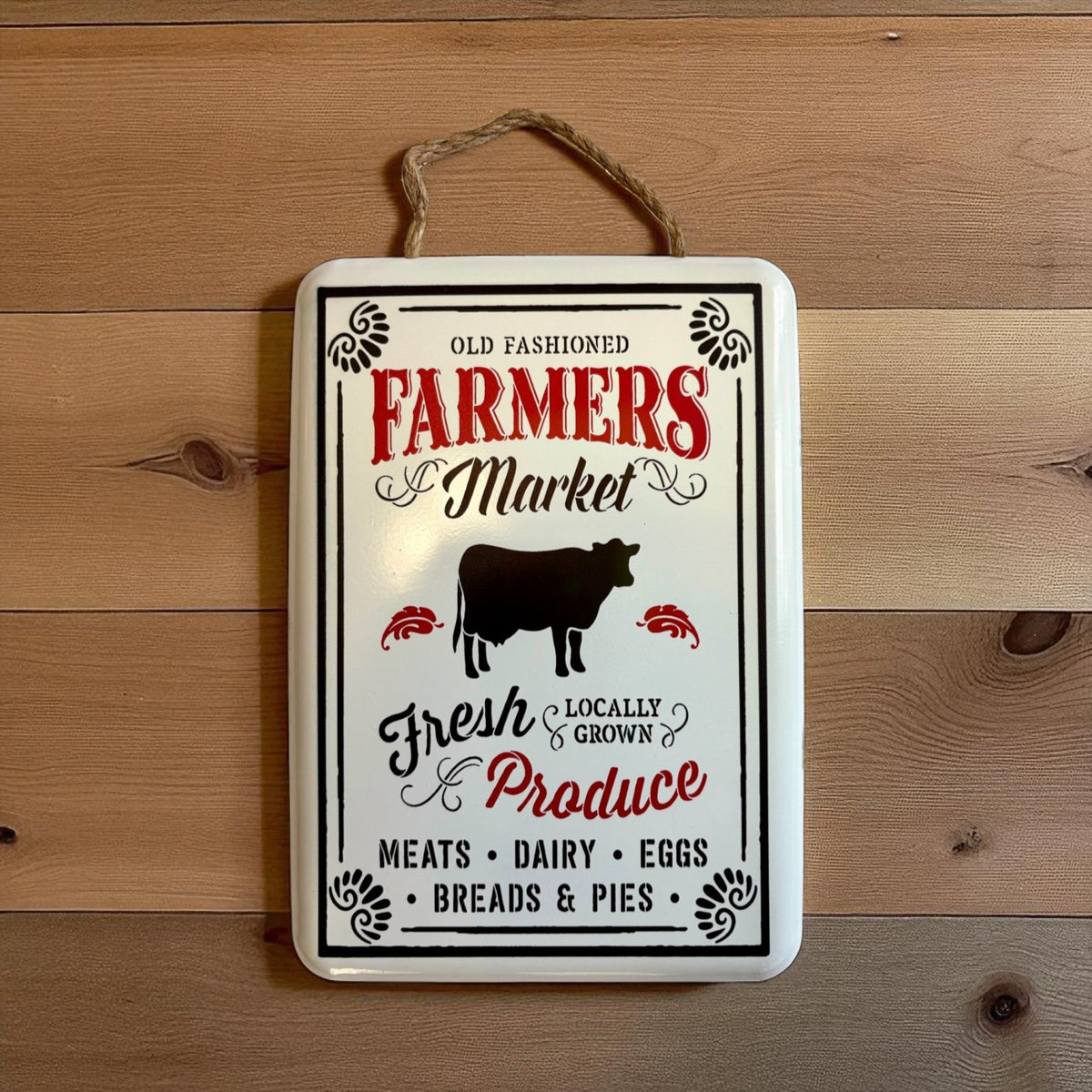 Vintage metal wall art sign with cow image, "Old Fashioned Farmers Market" lettering, by Iron & Blossom, rustic farmhouse decor.