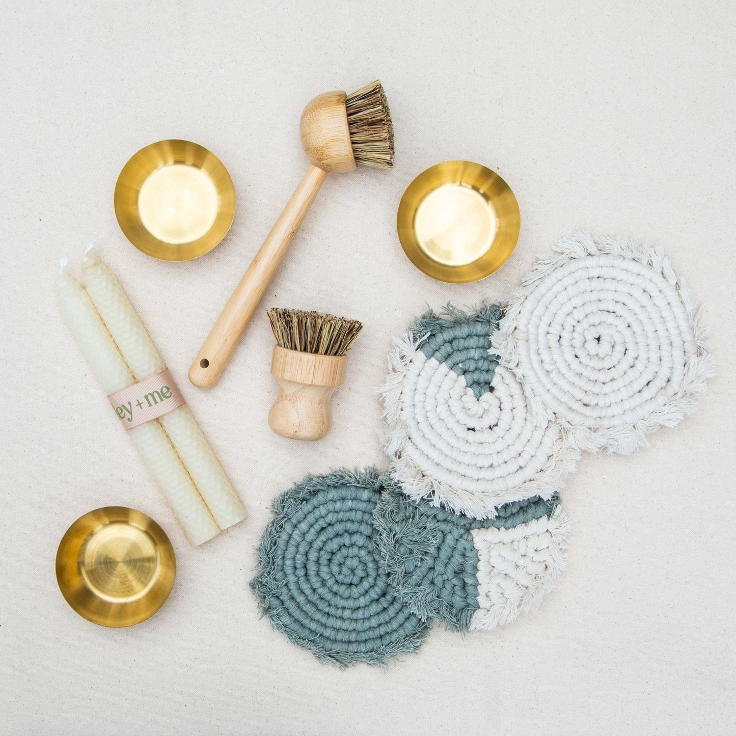 Set of four handmade macrame boho coasters by Tilley + Me, featuring intricate woven designs for stylish table decor.