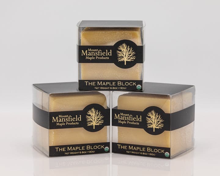 Mount Mansfield Maple Products maple candy block with rich golden color and smooth texture on a neutral background.