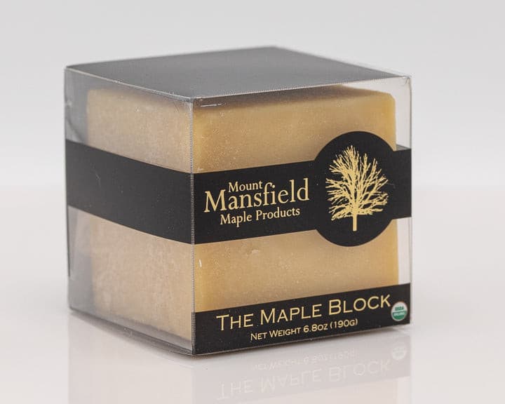 Close-up of Mount Mansfield Maple Products Maple Candy block with textured maple surface and rich amber color.
