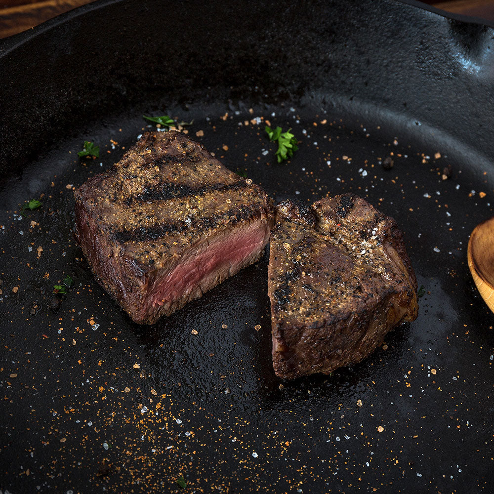 Cooked Nebraska Star Beef top sirloin steak from Honest Value Beef Package, featuring juicy beef slices with grill marks.