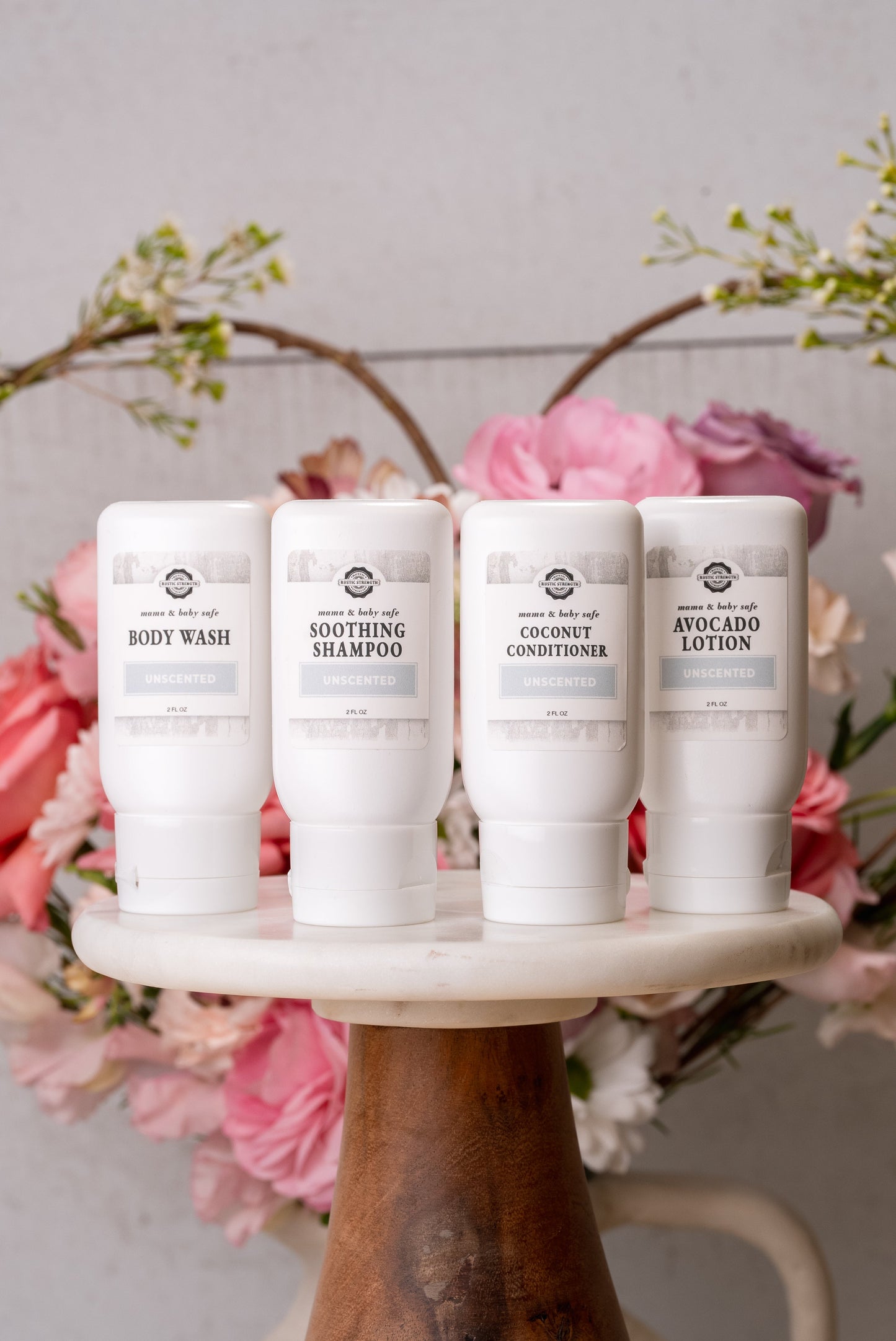 Rustic Strength travel kit for mama and baby, including 2 oz bath and body products in a compact set for on-the-go use.