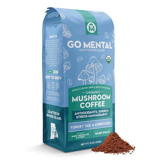 Turkey Tail and Cordyceps mushroom coffee adaptogens blend in a jar with a scoop, showcasing the GO MENTAL MUSHROOM COFFEE product.
