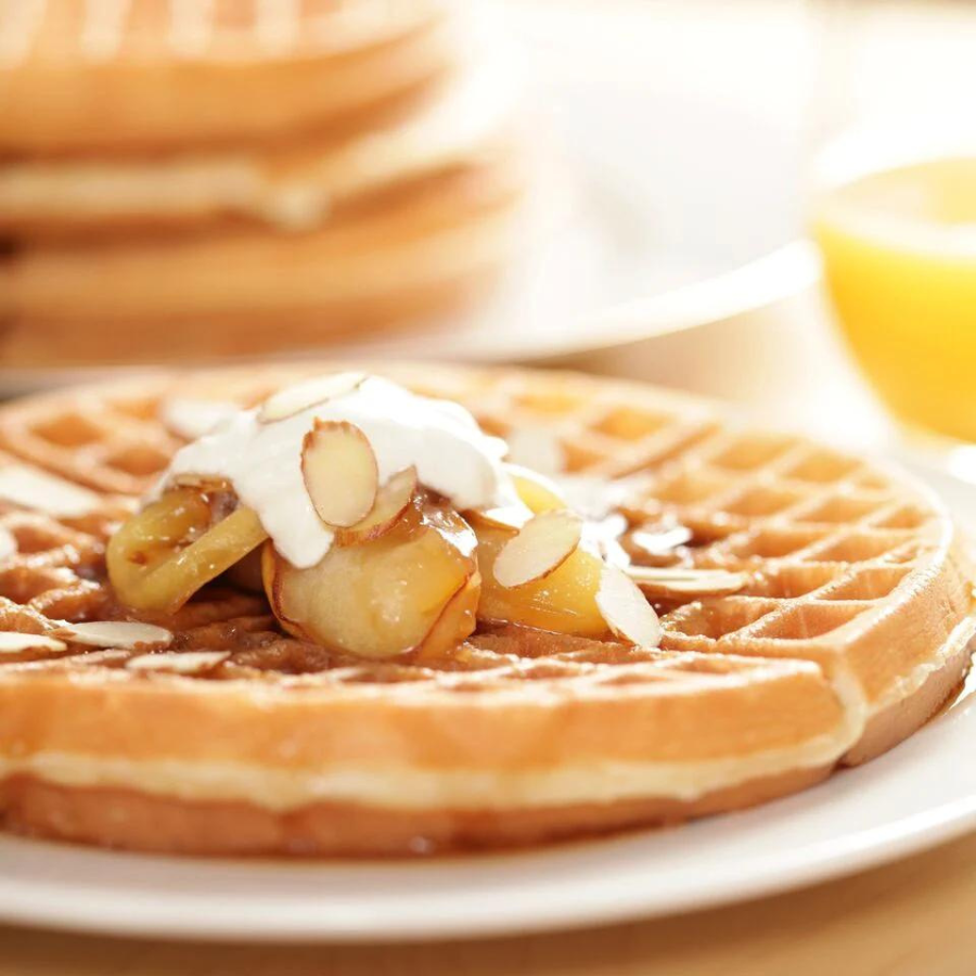 Belgian waffle mix from Heartland Gourmet in a 13.1 oz package, ideal for making fluffy, golden waffles at home.