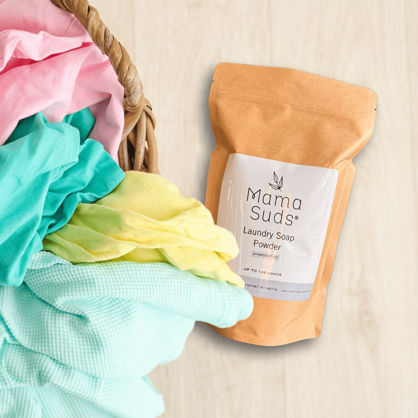 MamaSuds laundry soap powder in a white plastic container, designed for household cleaning and stain removal.