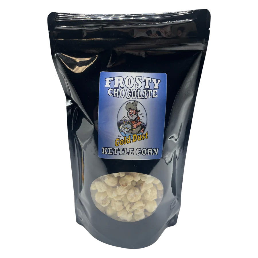 White chocolate-covered kettle corn in a 6 oz bag, gluten-free and non-GMO, with a gold dust finish from BuyNebraska.com.