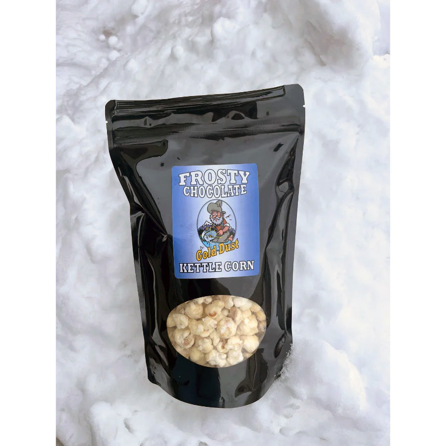 White chocolate-covered kettle corn in a 6 oz bag, gluten-free and non-GMO, with a golden dust coating from BuyNebraska.com