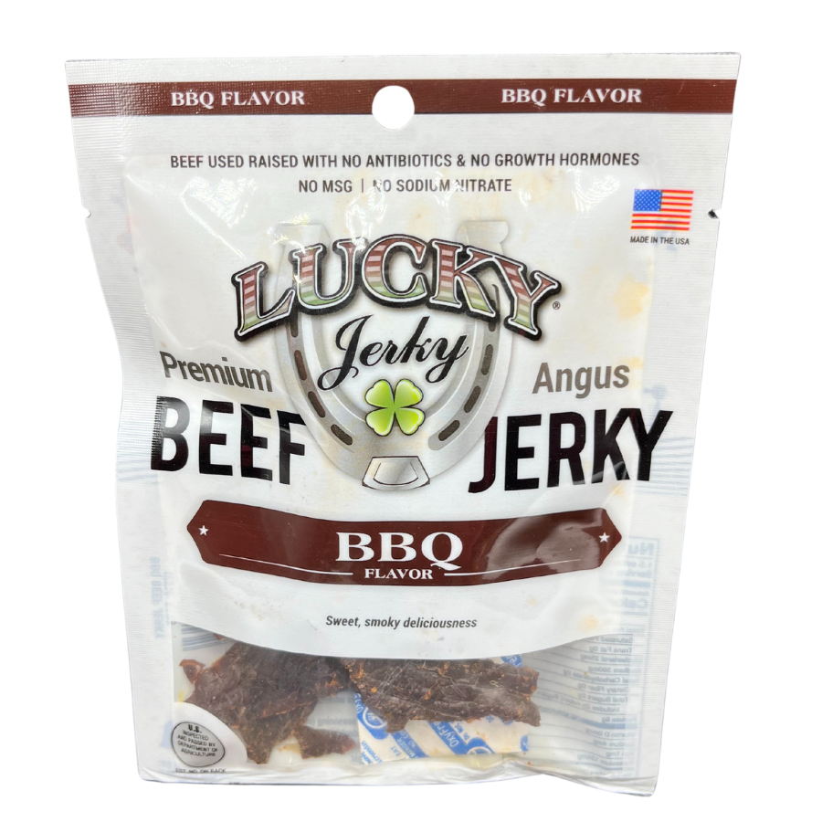 Nebraska Star Beef BBQ Beef Jerky in 1.5 oz package, showcasing thin sliced, smoked beef jerky with a smoky glaze.