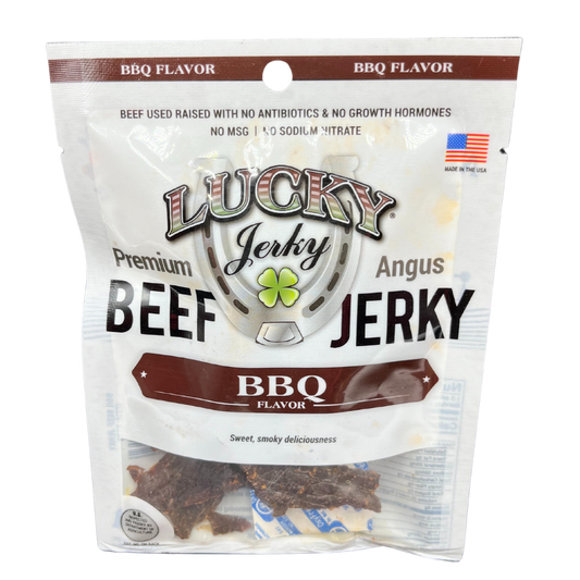Nebraska Star Beef BBQ Beef Jerky in 1.5 oz package, showcasing thin sliced, smoked beef jerky with a smoky glaze.