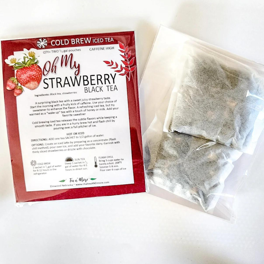 Cold brew black strawberry tea in pitcher, caffeinated beverage with two tea bags, ready to serve from BuyNebraska.com.