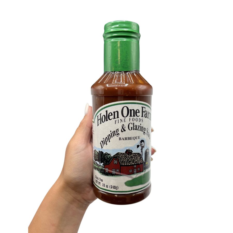Holen One Farms BBQ sauce, marinade, and seasoning set with bottles of flavorful sauces and spices for grilling and cooking.
