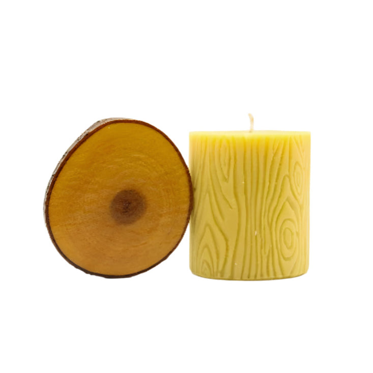 Beeswax candle with wooden base, 12 oz, in a natural home decor setting, showcasing the warm beeswax glow and rustic wooden holder.