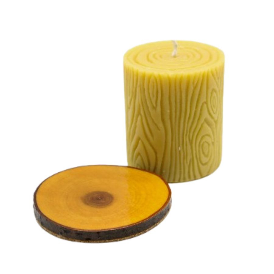 Beeswax candle with wooden base, 12 oz, from Buzz Savories LLC, in a cozy home and garden setting.