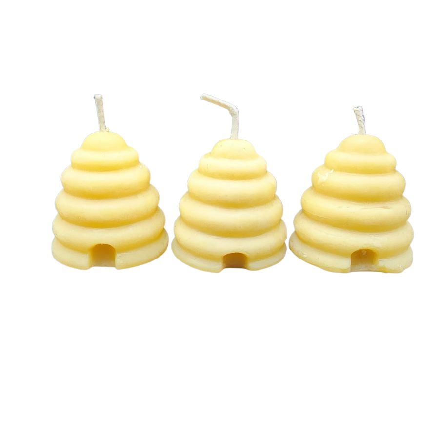 Beeswax candle in a 2 oz tin by Buzz Savories, LLC, featuring natural honey-colored beeswax with a cotton wick.
