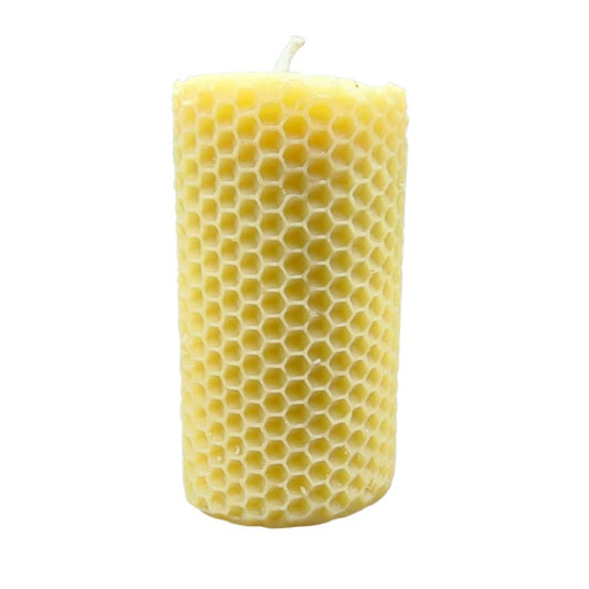 Beeswax honeycomb candle in a 6 oz jar, natural honey color, handcrafted by Buzz Savories, LLC for a warm, rustic look.