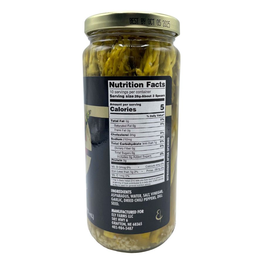 Jar of Ely Farms pickled asparagus spears in a 16 oz container, with fresh green asparagus visible through the clear glass.