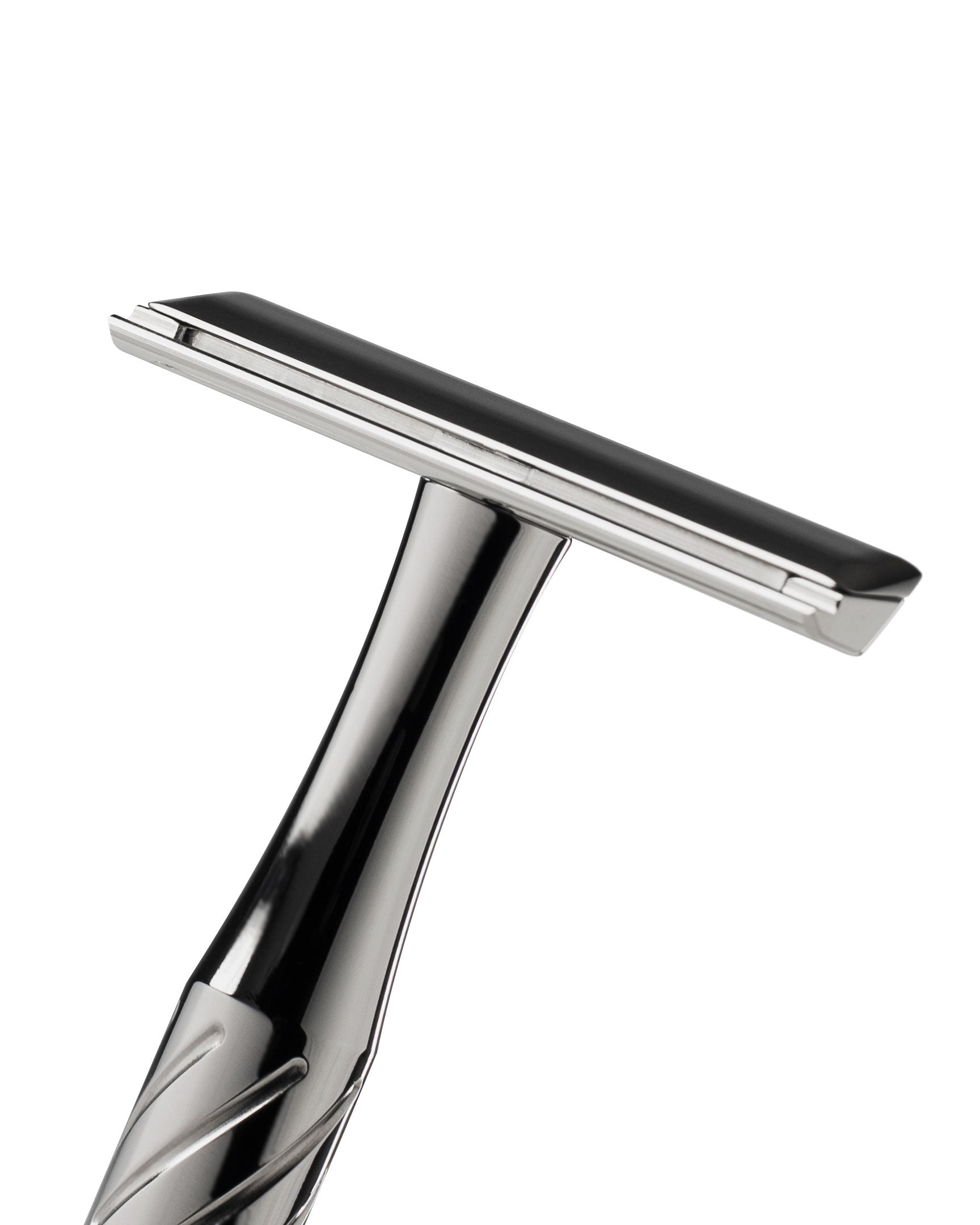 Blackland Razors Vector Titanium razor with sleek stainless steel handle and precision blade in a close-up shot.