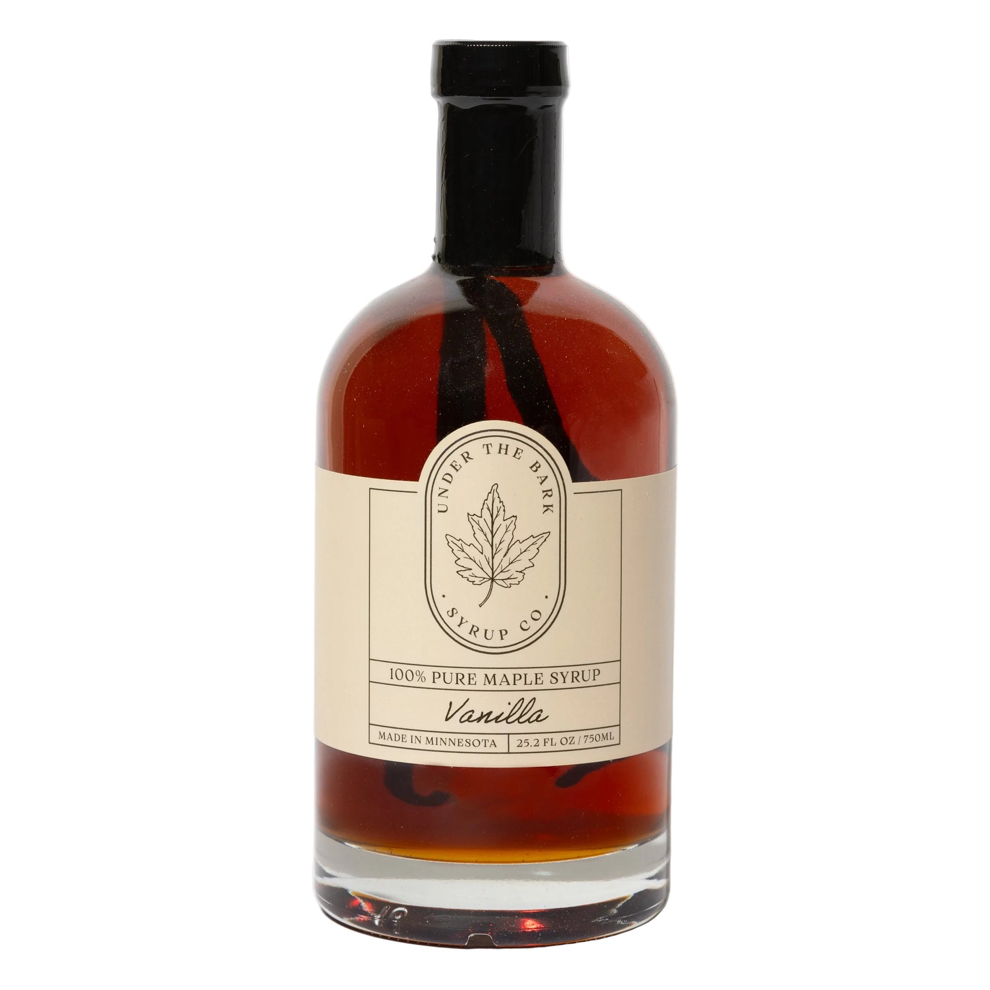 25oz bottle of Vanilla Maple Syrup by Under The Bark Syrup Co, featuring a clear label and golden syrup inside.