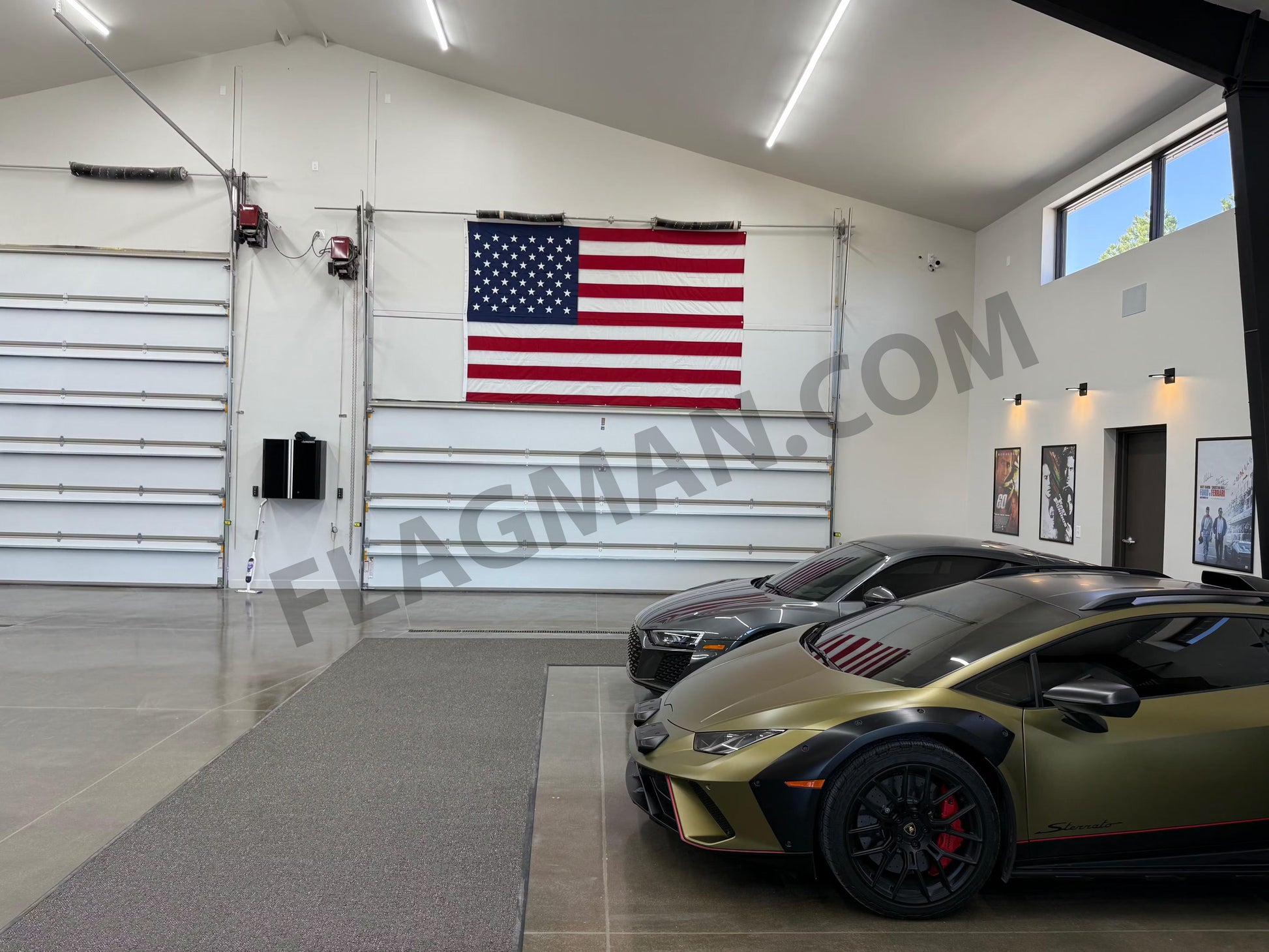 Nylon American flag wall-mounted with reinforced edge grommets, made in USA, displayed on a wall.