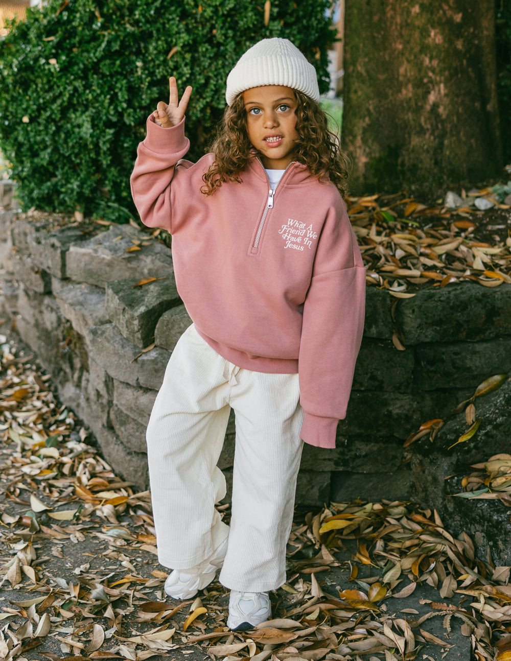 Kids jacket by Elevated Faith featuring a half-zip design with "What a Friend in Jesus" print, suitable for children.