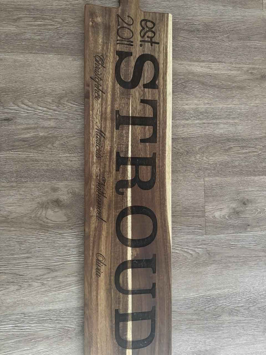 Custom engraved wooden charcuterie board with personalized design, serving tray from C2 Creations LLC, featuring a polished finish.