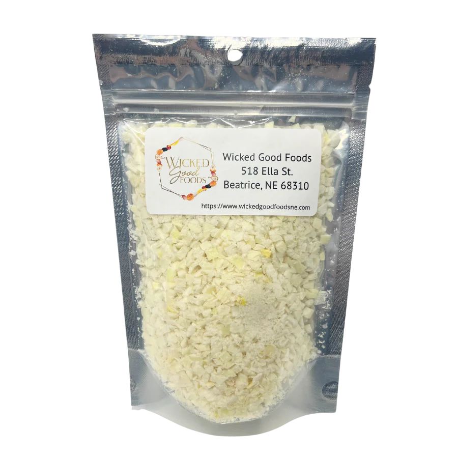 Freeze dried yellow onions from Wicked Good Foods in a 1 oz package, ideal for cooking and seasoning.