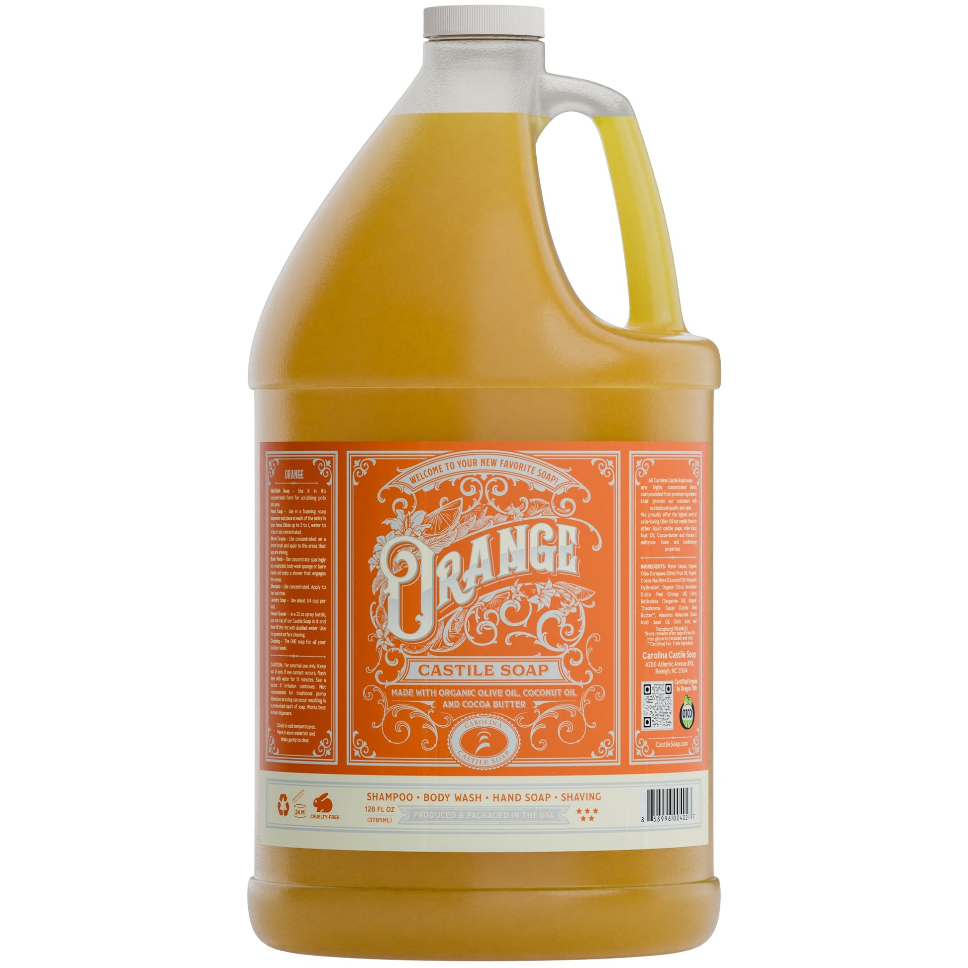 Liquid orange castile soap from Carolina Castile Soap in a clear pump bottle, showing bright orange liquid inside.