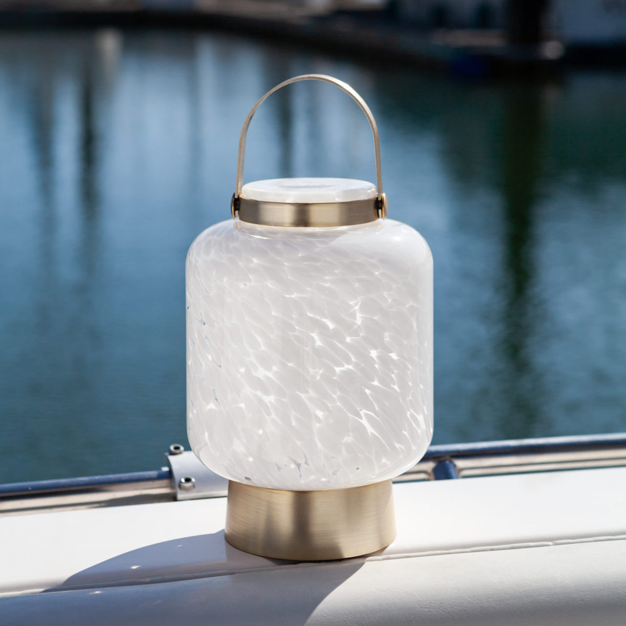Allsop Home & Garden LightKeeper Lanterns with rechargeable glass LED lanterns, featuring a classic cone shape and soft illumination.