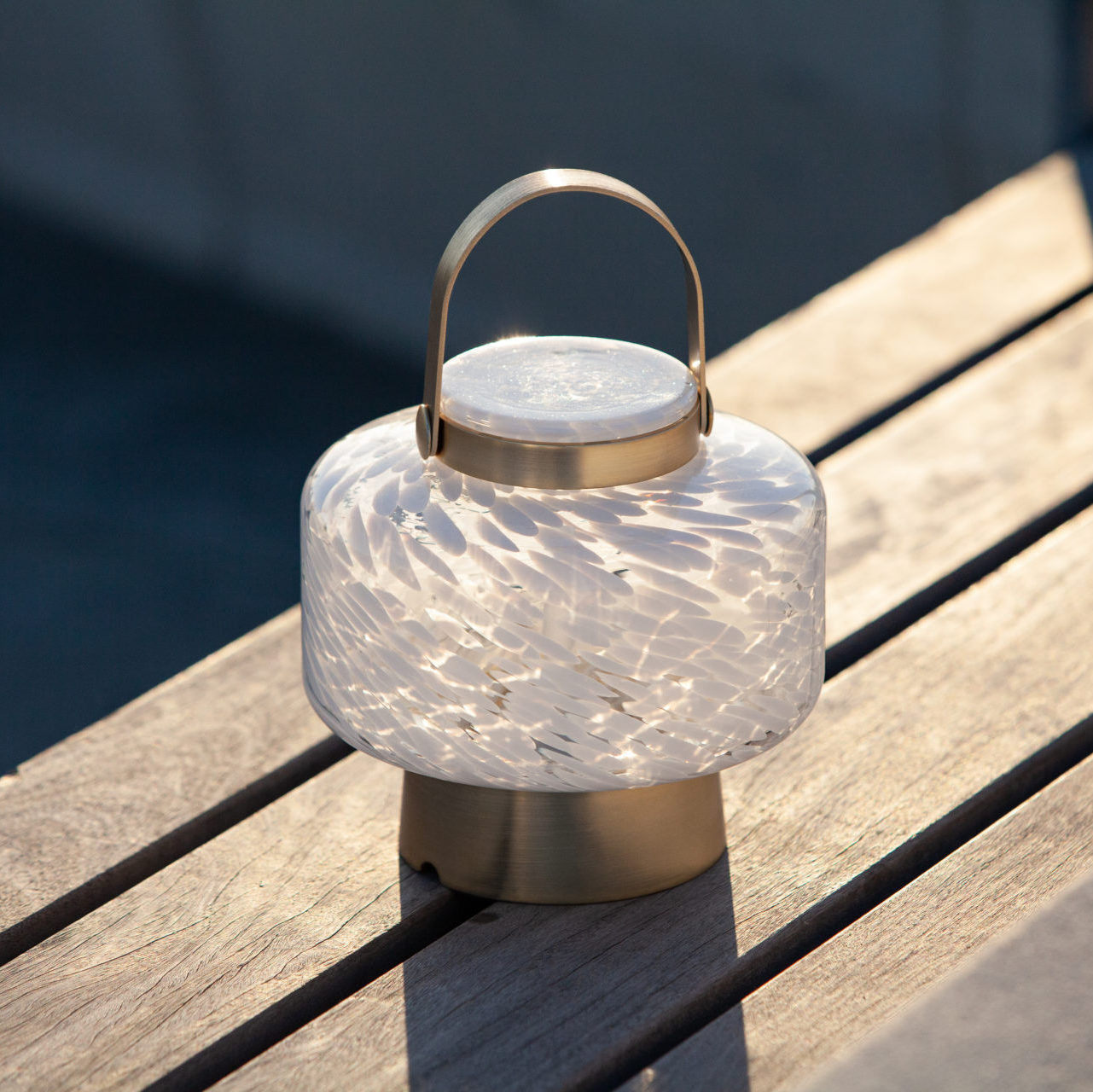 Rechargeable glass LED lanterns from LightKeeper Lanterns by Allsop Home & Garden, showing a clear glass design with LED light inside.