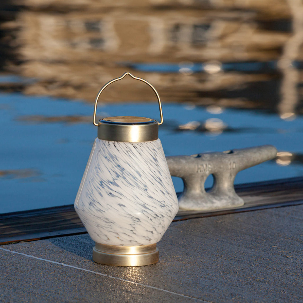 Allsop Home & Garden Boaters Glass Solar Lanterns with cylindrical design and clear glass panels, ideal for outdoor lighting.