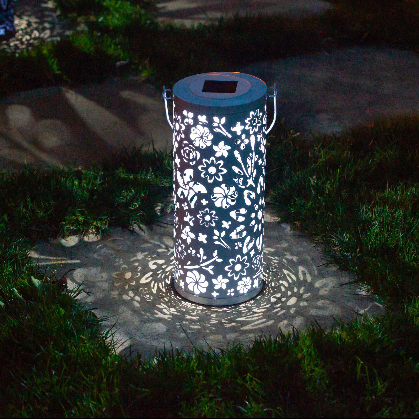 White Bloom Punched Metal Solar Lantern by Allsop Home & Garden, featuring intricate punched metal design and solar-powered lighting.