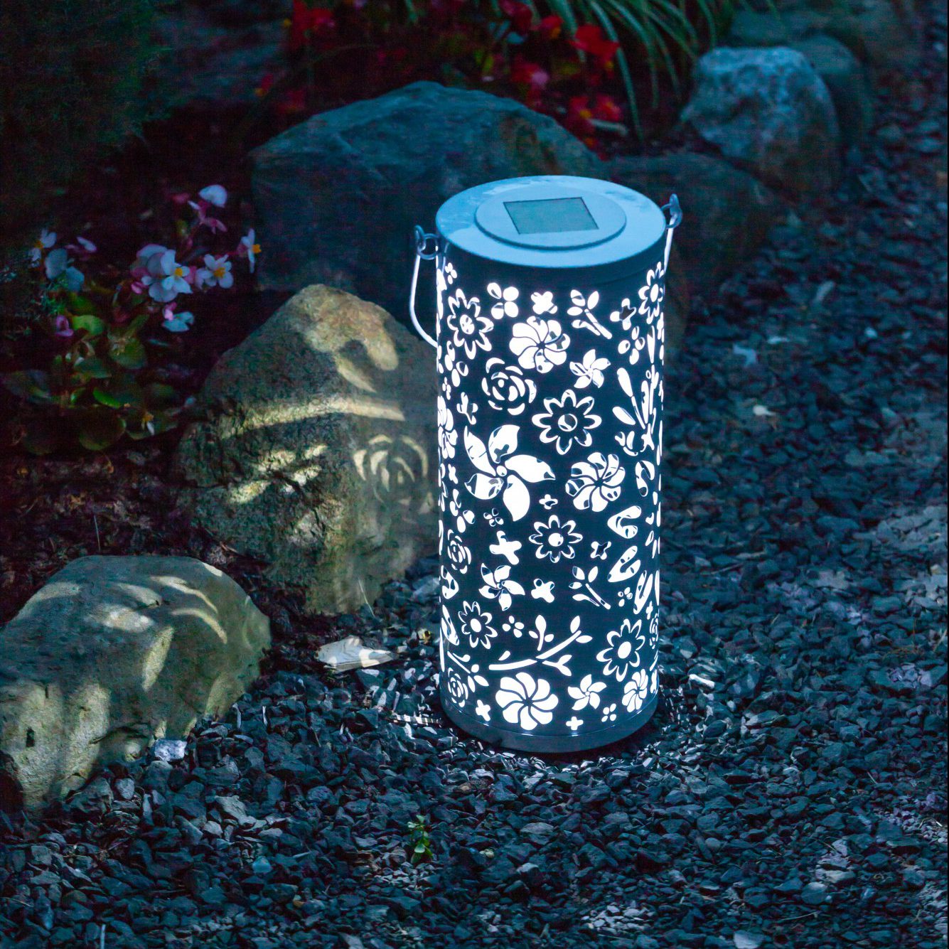 White Bloom Punched Metal Solar Lantern by Allsop Home & Garden, featuring intricate punched metal design and outdoor lighting.